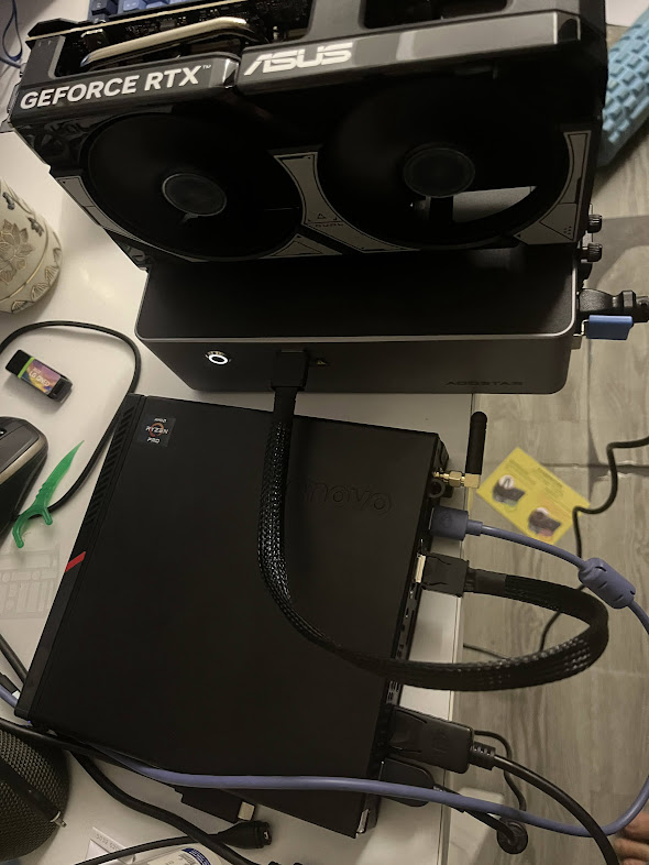GPU enclosure with OCuLink and power cables connected during assembly