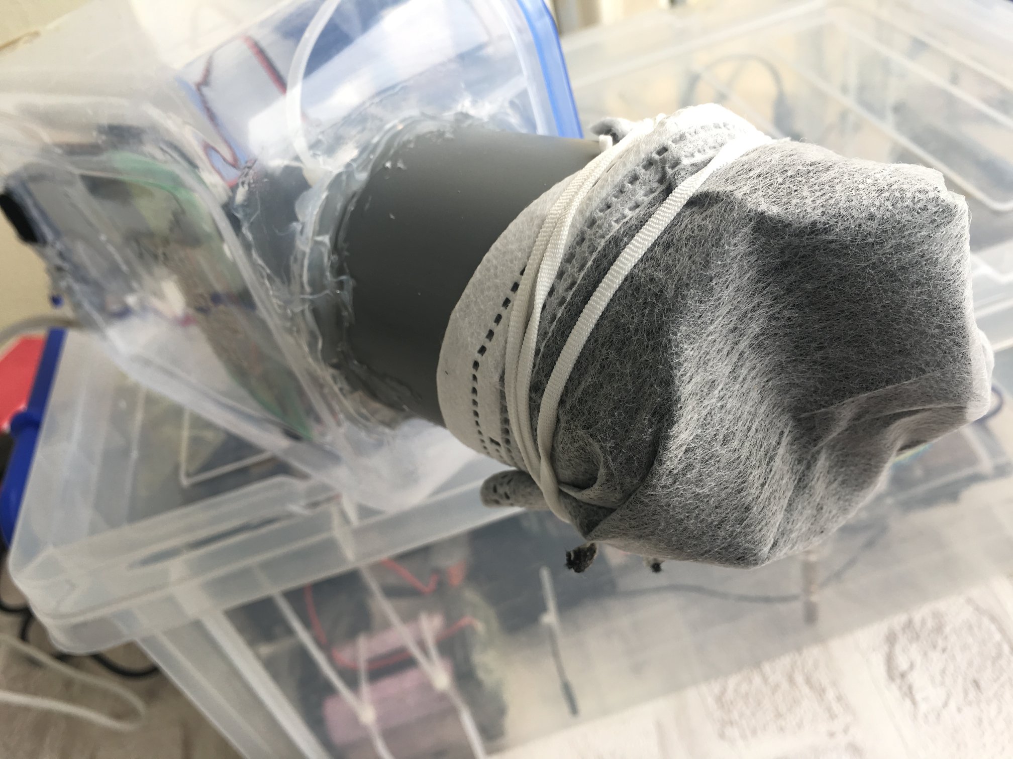 Mask mounted on the PVC pipe during the filtration experiment